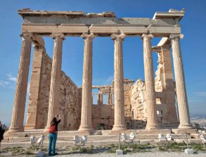 The Erechtheion or Erechtheum. an ancient Greek temple on the north side of the Acropolis of Athens dedicated to Athena and Poseidon